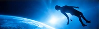 Symbolic silhouette floating above the blue curve of Earth